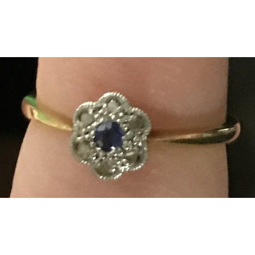 69 - LOVELY 18CT GOLD & PLATINUM RING WITH DAISY TOP SET SMALL DIAMONDS AND BLUE SAPHIRE - SOME CHIPS TO ... 