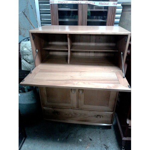 7 - LOVELY ERCOL CABINET WITH CUPBOARD, DRAWER AND DROP FRONT - ON WHEELS - 82CMS W X 110CMS H X 44CMS D... 