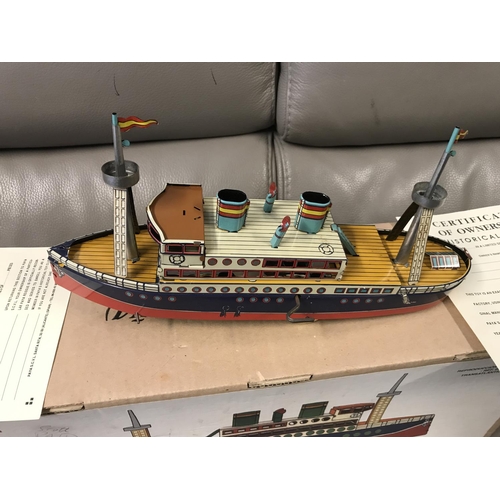 266 - BOXED LTD ISSUE HISTORICAL TOY OF A CLOCKWORK TIN SHIP - 33CMS IN LENGTH