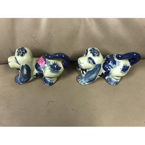 311 - PAIR OF ORIENTAL STYLE DOGS - 22CMS LENGTH