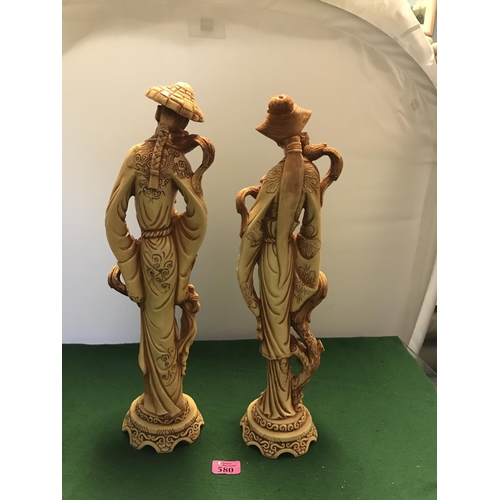 580 - PAIR OF ORIENTAL STYLE RESIN FIGURES - 50CMS H