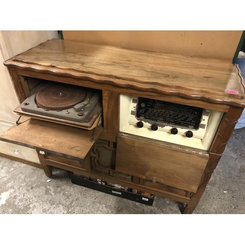 592 - LOVELY POPTEJOLY 1955 RADIOGRAMME WITH RECORD DECK IN A LOVELY WOODEN CARVED UNIT - 110CMS X 90CMS H... 