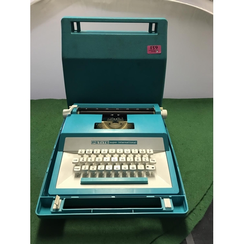 651 - VINTAGE CASED CHILDS PETITE SUPER INTERNATIONAL PORTABLE TYPEWRITER - A/F HINGES ON CASE