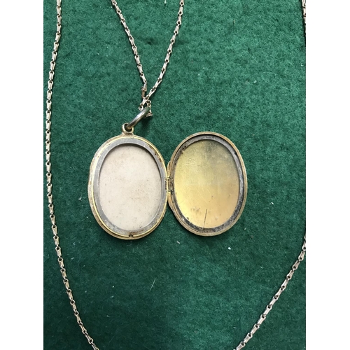 718 - VERY PRETTY UNMARKED LOCKET SET PEARLS ON A 15CT GOLD CHAIN