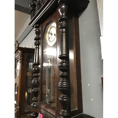 137 - LARGE EARLY WALL CLOCK WITH ENAMEL & BRASS FACE & ORNATE CARVED TOP FINIAL AND COLUMNS - 40CMS X 100... 