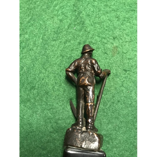 65 - BRONZE STATUE OF A FARM HAND - CHIP TO BASE - 15CMS H