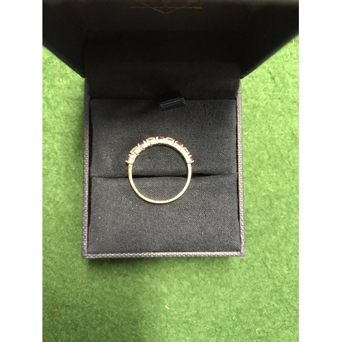 91 - PRETTY 9CT GOLD RING SET STONES