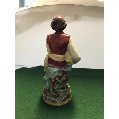 380 - UNUSUAL LARGE EARLY STAFFORDSHIRE FIGURE OF A YOUNG MAN WITH BASKET OF VEGETABLES - 34CMS H