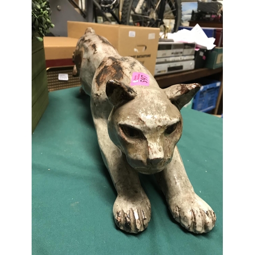 597 - LARGE HEAVY POTTERY CAT IN THE STALKING POSITION - 60CMS LONG X 16CMS H