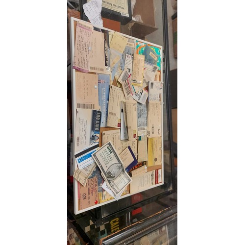 191 - NOTICE BOARD WITH CONCERT TICKETS INC BLONDIE 2010, THE EAGLES 2006, ERIC CLAPTON 2013, HUMAN LEAGUE... 