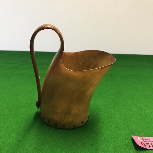 58 - EARLY HORN JUG - 15CMS TO TOP OF HANDLE