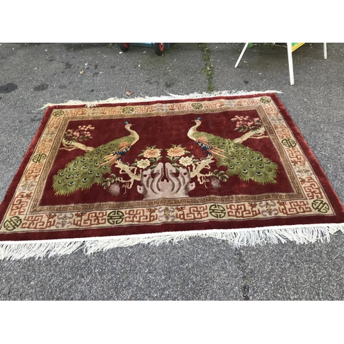 42 - PATTERNED ORIENTAL STYLE RUG - USED - 130CMS X 180CMS
