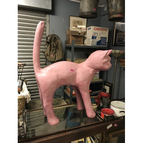 29 - VERY LARGE PINK RESIN CAT - STANDS OVERALL 105CMS X 85CMS LONG - COLLECTION ONLY OR ARRANGE OWN COUR... 