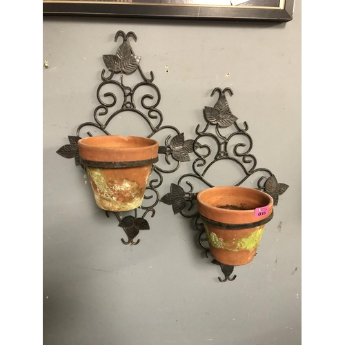 36 - PAIR OF PRETTY METAL WALL HANGING POT HOLDERS DEPICTING LEAVES WITH A TERRACOTTA POT IN EACH - 36CMS... 