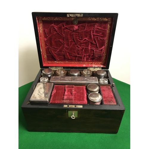 471 - EARLY WOODEN CASED VANITY SET WITH BEAUTIFUL RED VELVET INTERIOIR - SOME DAMAGE COMMENSURATE WITH AG... 