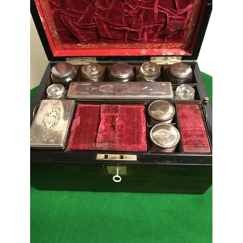 471 - EARLY WOODEN CASED VANITY SET WITH BEAUTIFUL RED VELVET INTERIOIR - SOME DAMAGE COMMENSURATE WITH AG... 