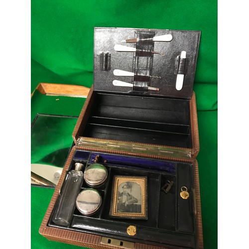 110 - EARLY LEATHER TRAVEL VANITY BOX WITH SHAVING MIRROR, SMALL FRAMED PICTURE,  ETC