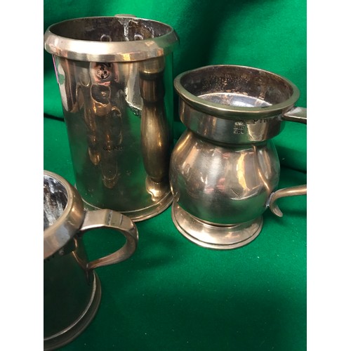 261 - 4 X BRASS TANKARDS WITH M EASURES FOR 1 QUART, 1 PINT, 2 X HALF PINT