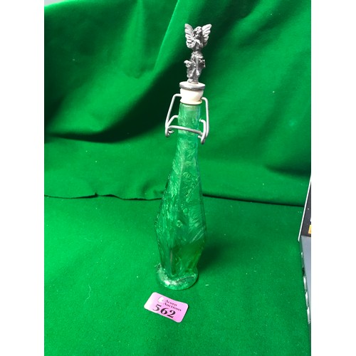 562 - UNUSUAL GREEN GLASS BOTTLE WITH METAL FAIRY TOP - 25CMS H