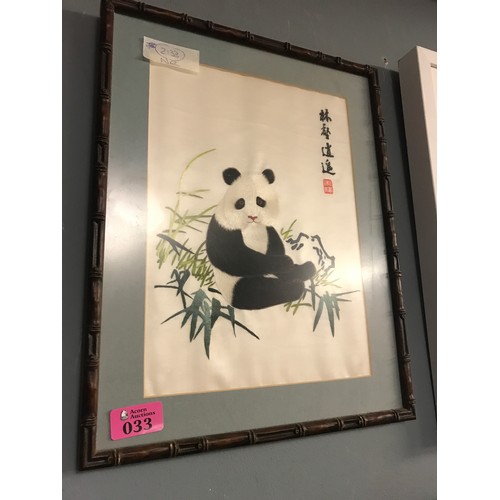33 - FRAMED & GLAZED ORIENTAL SILK PICTURE OF A PANDA WITH BAMBOO EFFECT FRAME - 30CMS X 40CMS