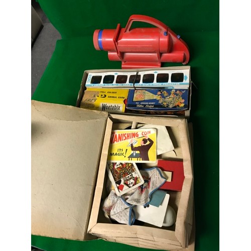 214 - DISNEY TOY PROJECTOR WITH SLIDES ETC  & SOOTY BOOK OF MAGIC