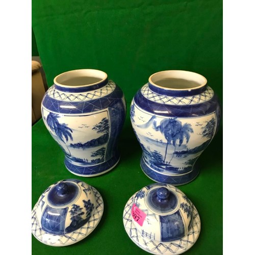 397 - PAIR OF BLUE AND WHITE LIDDED GINGER JARS - 30CMS H