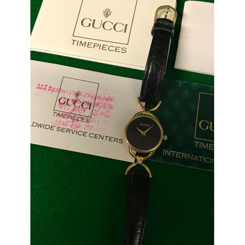30 - LADIES GUCCI WATCH WITH PAPERWORK - CLOCKS AND WATCHES ARE NOT TESTED