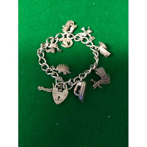 70 - SILVER CHARM BRACELET - APPROX WEIGHT 30 GRMS