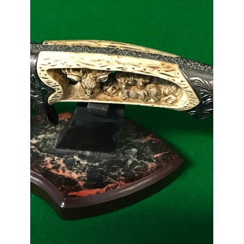 630 - DECORATIVE REPRODUCTION OF A BOWIE KNIFE ON STAND - OVER 18s ONLY