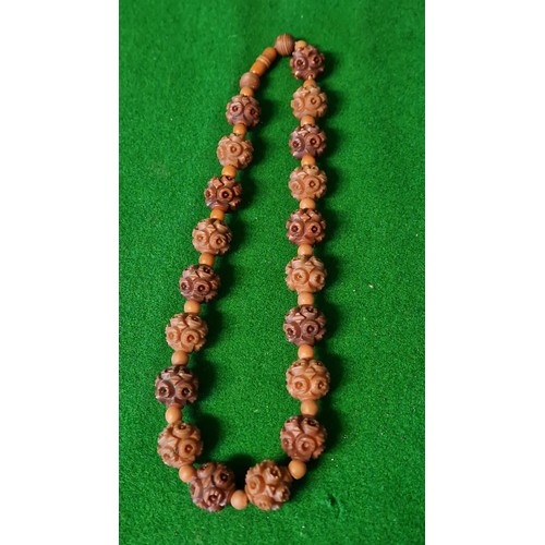 167 - 19TH C CARVED COQUILLA NUT NECKLACE