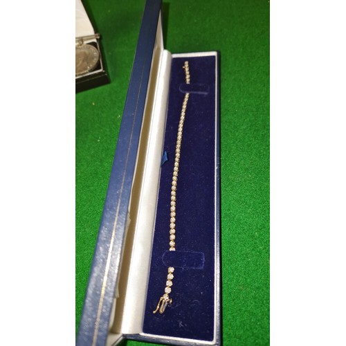 275 - BEAUTIFUL 9CT GOLD DIAMOND TENNIS BRACELET - 5.5 GRMS OVERALL