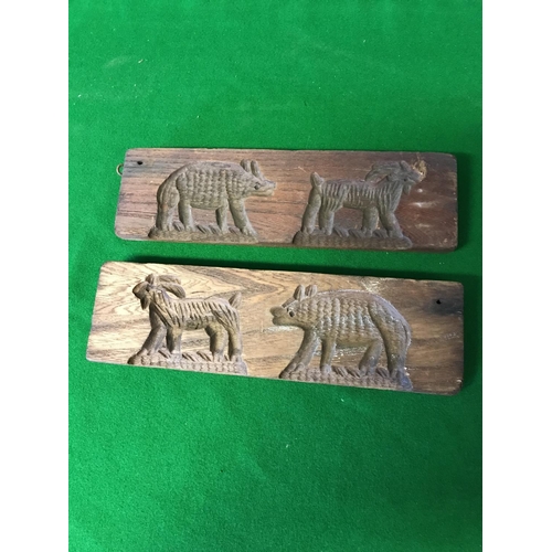 613 - 2 X CARVED WOODEN MOULDS OF ANIMALS - 30CMS X 9CMS