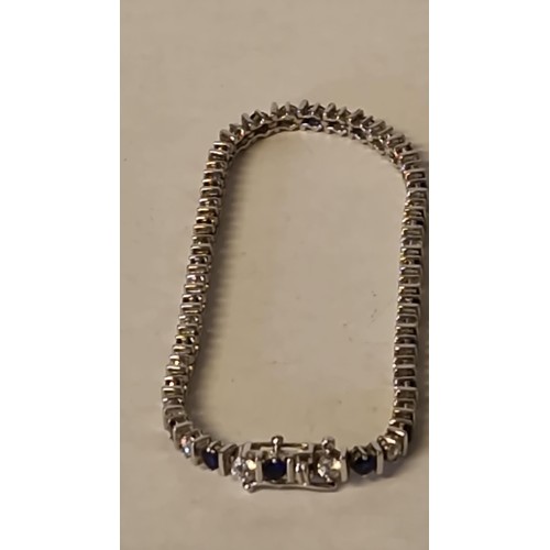 109 - SILVER TENNIS BRACELET SET STONES