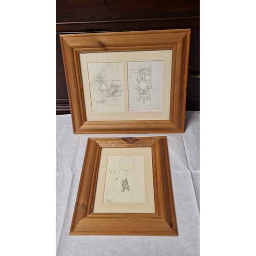 314 - 2 X FRAMED & GLAZED PICTURES OF WINNIE THE POOH SKETCHES - 28CMS X 24CMS & 34CMS X 28CMS