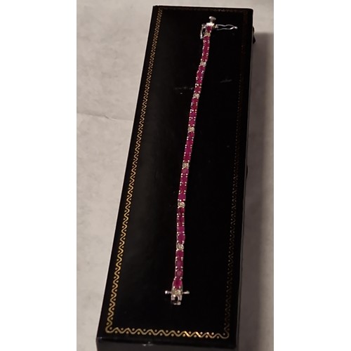 70 - VERY PRETTY SILVER & RUBY TENNIS BRACELET