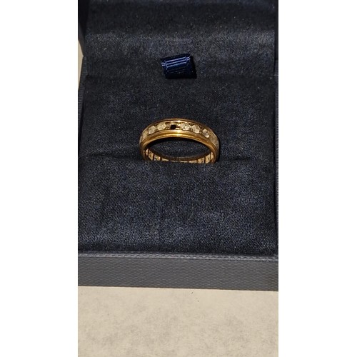 103 - 18K GOLD VINTAGE ETERNITY RING - 2 STONES MISSING