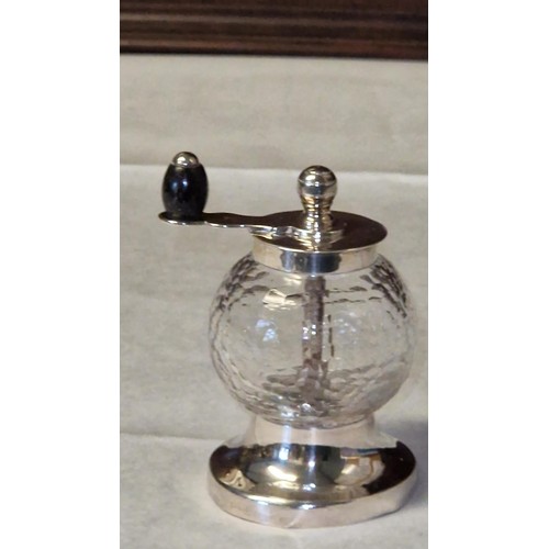 130 - BEAUTIFUL SILVER HALLMARKED GLASS AND SILVER PEPPER GRINDER - DOES HAVE DENT TO BOTTOM - STANDS 9CMS... 