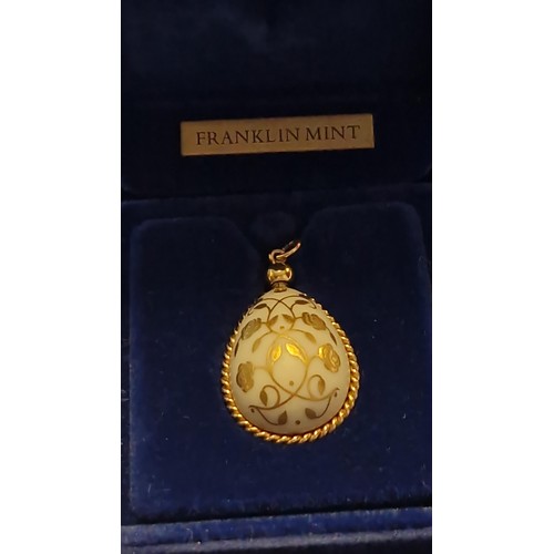 159 - LOVELY BOXED THE EASTER EGG PENDANT - CRAFTED IN PURE BISQUE PORCELAIN DECORATED WITH 24CT GOLD - WI... 