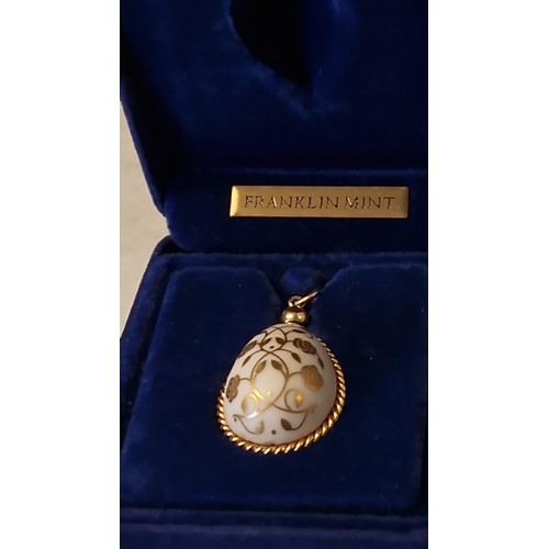 159 - LOVELY BOXED THE EASTER EGG PENDANT - CRAFTED IN PURE BISQUE PORCELAIN DECORATED WITH 24CT GOLD - WI... 