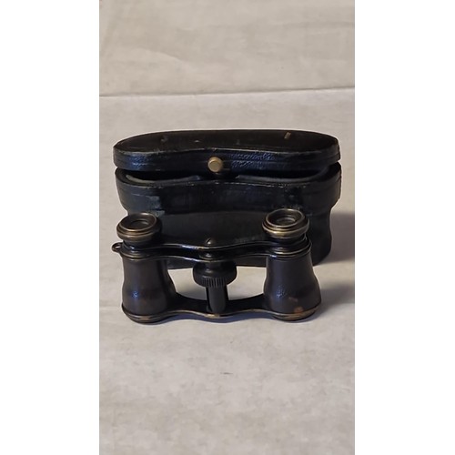 212 - PAIR OF CASED SMALL VINTAGE BINOCULARS - 68CMS X 4CMS