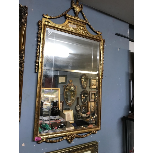 81 - LARGE DECORATIVE GILT FRAMED MIRROR - 70CMS X 110CMS OVERALL - COLLECTION ONLY OR ARRANGE OWN COURIE... 