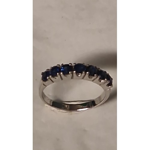 181 - BEAUTIFUL STERLING SILVER SEVEN STONE SAPPHIRE RING - RING SIZE