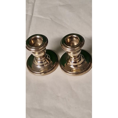 189 - PAIR OF LOVELY HALLMARKED STERLING SILVER CANDLESTICKS - IN ORIGINAL BOX - 4.5CMS H - WOULD MAKE A L... 