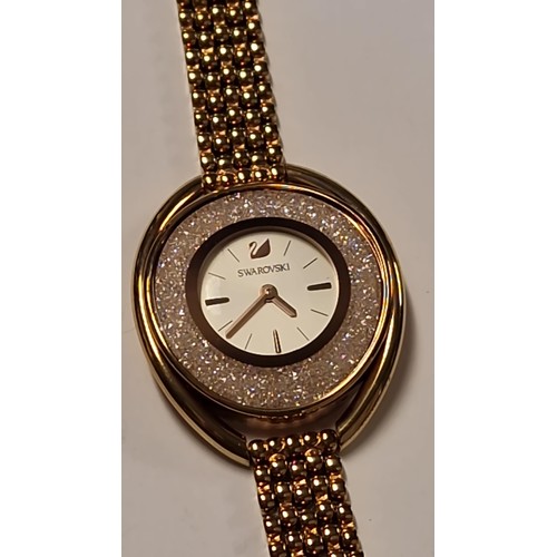 215 - LOVELY SWAROVSKI CRYSTAL WATCH & SWAROVSKI BANGLE - CLOCKS AND WATCHES ARE NOT TESTED