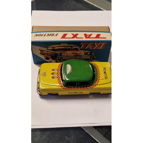 436 - BOXED VINTAGE FRICTION TAXI TIN PLATE TOY - MADE IN JAPAN - USED CONDITION