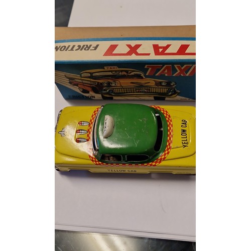 436 - BOXED VINTAGE FRICTION TAXI TIN PLATE TOY - MADE IN JAPAN - USED CONDITION