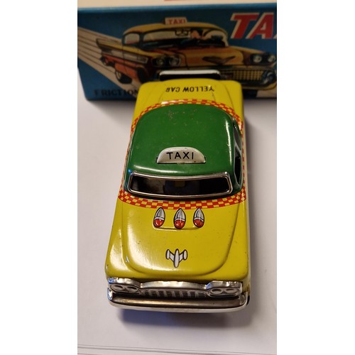 436 - BOXED VINTAGE FRICTION TAXI TIN PLATE TOY - MADE IN JAPAN - USED CONDITION