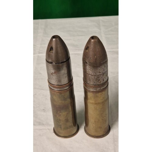 704 - PAIR OF MILITARY WW1 SHELL CASINGS - STANDS 18CMS H