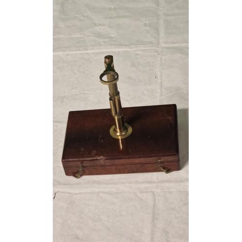 715 - CASED VINTAGE SIMPLE BRASS MICROSCOPE CIRCA 19TH CENTURY