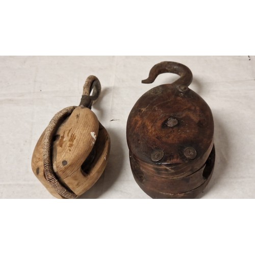 908 - 2 X EARLY WOODEN PULLEYS